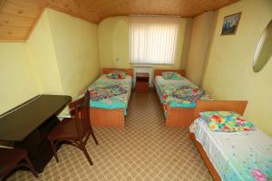 Krevet ili kreveti u jedinici u objektu Guest House Ekaterina