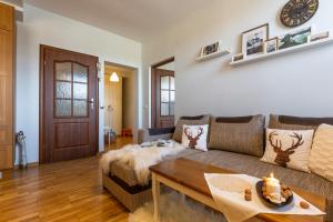 Posezení v ubytování Apartamenty Tatrzańskie Turnie