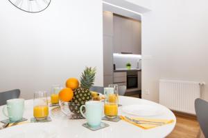 Kuchyň nebo kuchyňský kout v ubytování Luxury Main Square Apartments