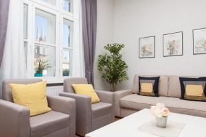 Posezení v ubytování Luxury Main Square Apartments