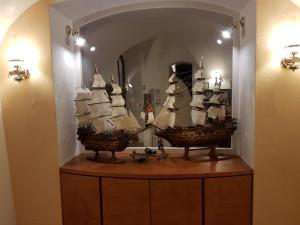 a display of a pirate ship on a table at Hotel Argentina in Santa Margherita Ligure
