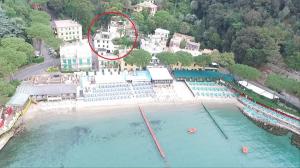 an aerial view of a swimming pool with a red circle at Hotel Argentina in Santa Margherita Ligure