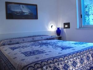 Cama o camas de una habitación en Le Palme Garden