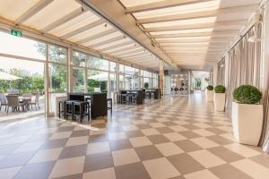 Reštaurácia alebo iné gastronomické zariadenie v ubytovaní Savoia Hotel Regency