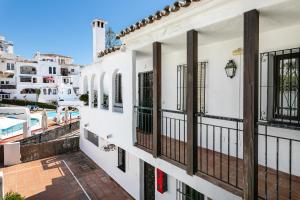 The swimming pool at or close to weforyou near the beach TWO bedrooms in Pueblo Evita