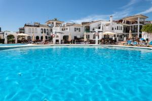 The swimming pool at or close to weforyou near the beach TWO bedrooms in Pueblo Evita