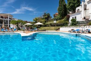 The swimming pool at or close to weforyou near the beach TWO bedrooms in Pueblo Evita