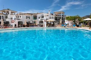 The swimming pool at or close to weforyou near the beach TWO bedrooms in Pueblo Evita