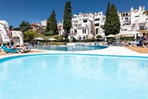 The swimming pool at or close to weforyou near the beach TWO bedrooms in Pueblo Evita