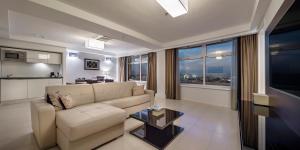 Posezení v ubytování Fraser Suites Abuja