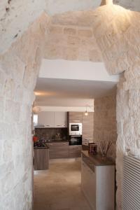 Η κουζίνα ή μικρή κουζίνα στο Trulli a Sud-Est