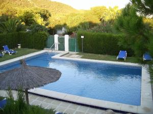 Πισίνα στο ή κοντά στο Las Casas de las Flores