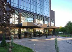 a large building with a lot of windows at Point Hotel Ankara in Ankara