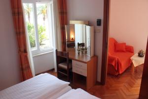 Voodi või voodid majutusasutuse Hotel Concordia toas