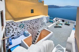 Foto de la galería de EverBlue Cave house by Thireon en Oia