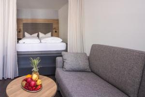 מיטה או מיטות בחדר ב-Hotel am See