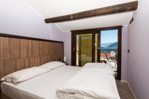 A bed or beds in a room at Nuovo Bar Centrale