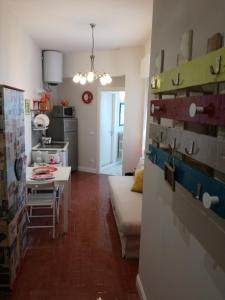 Kuchyň nebo kuchyňský kout v ubytování Il Grattacielo B&B