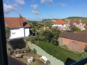 a view from a window of a town with buildings at Highfield Guest House in Sheringham