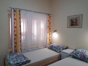 A bed or beds in a room at Hostel Beko