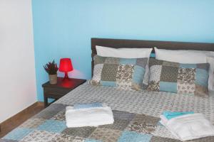Postel nebo postele na pokoji v ubytování Souzana Rooms