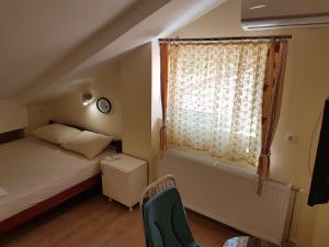 A bed or beds in a room at Hostel Beko