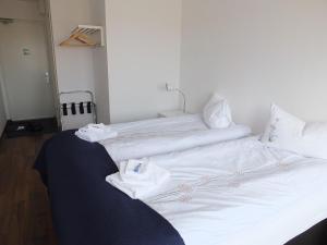 Letto o letti in una camera di apartment Neðra-Vatnshorn