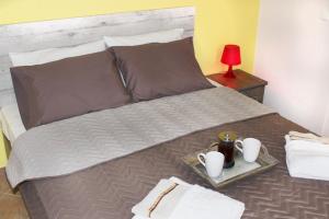 Postel nebo postele na pokoji v ubytování Souzana Rooms