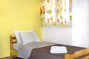 Postel nebo postele na pokoji v ubytování Souzana Rooms