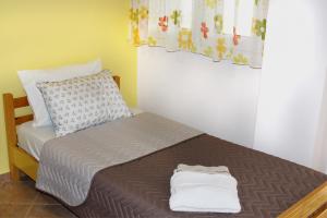 Postel nebo postele na pokoji v ubytování Souzana Rooms