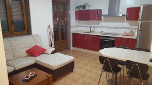 A kitchen or kitchenette at Alojamientos A Pedra