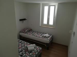 Postel nebo postele na pokoji v ubytování Top Line Apartments