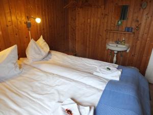 Letto o letti in una camera di apartment Neðra-Vatnshorn