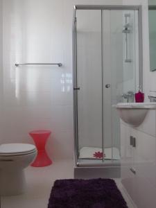 Een badkamer bij Alojamento Cesarini