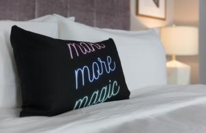 Postel nebo postele na pokoji v ubytování Hotel Trundle