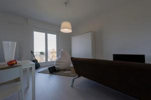 A seating area at Little House With Lake View