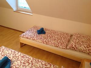A bed or beds in a room at Privat Monika