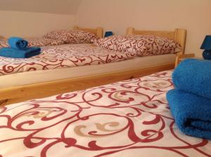 A bed or beds in a room at Privat Monika