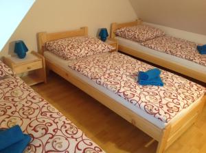 A bed or beds in a room at Privat Monika