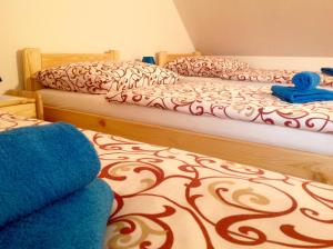 A bed or beds in a room at Privat Monika