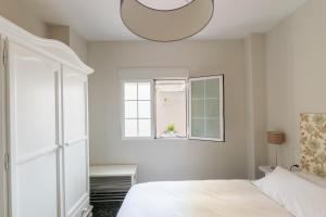 Posteľ alebo postele v izbe v ubytovaní Apartamento valencia centro