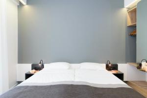 Postel nebo postele na pokoji v ubytování Renieris Hotel