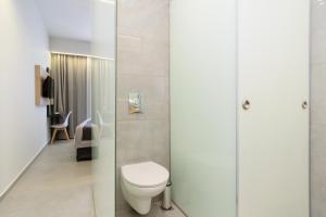 Koupelna v ubytování Renieris Hotel