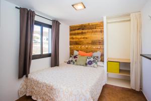 Postel nebo postele na pokoji v ubytování Eslanzarote Pico Colorado Loft in Soo, Super Wifi, Sat tv