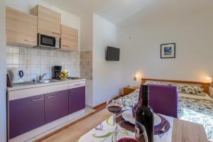 Η κουζίνα ή μικρή κουζίνα στο Apartment Monica