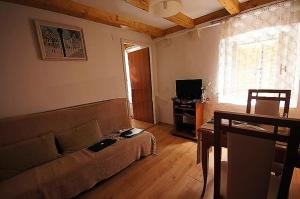 TV a/nebo společenská místnost v ubytování Apartments Imperial