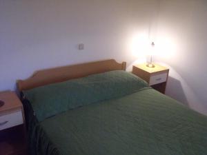 Postel nebo postele na pokoji v ubytování Apartments Imperial