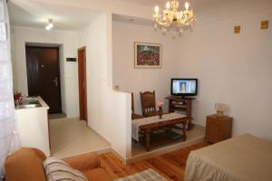TV a/nebo společenská místnost v ubytování Apartments Imperial