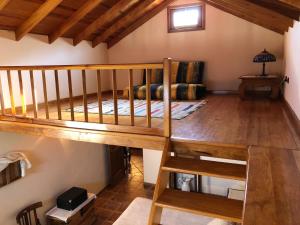a room with a bunk bed and a loft at El Pajero de Erese in Erese