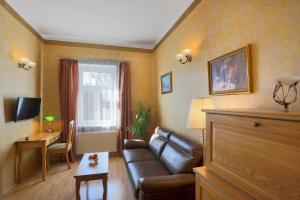 Televízia a/alebo spoločenská miestnosť v ubytovaní Hotel Štekl - Hrubá Skála